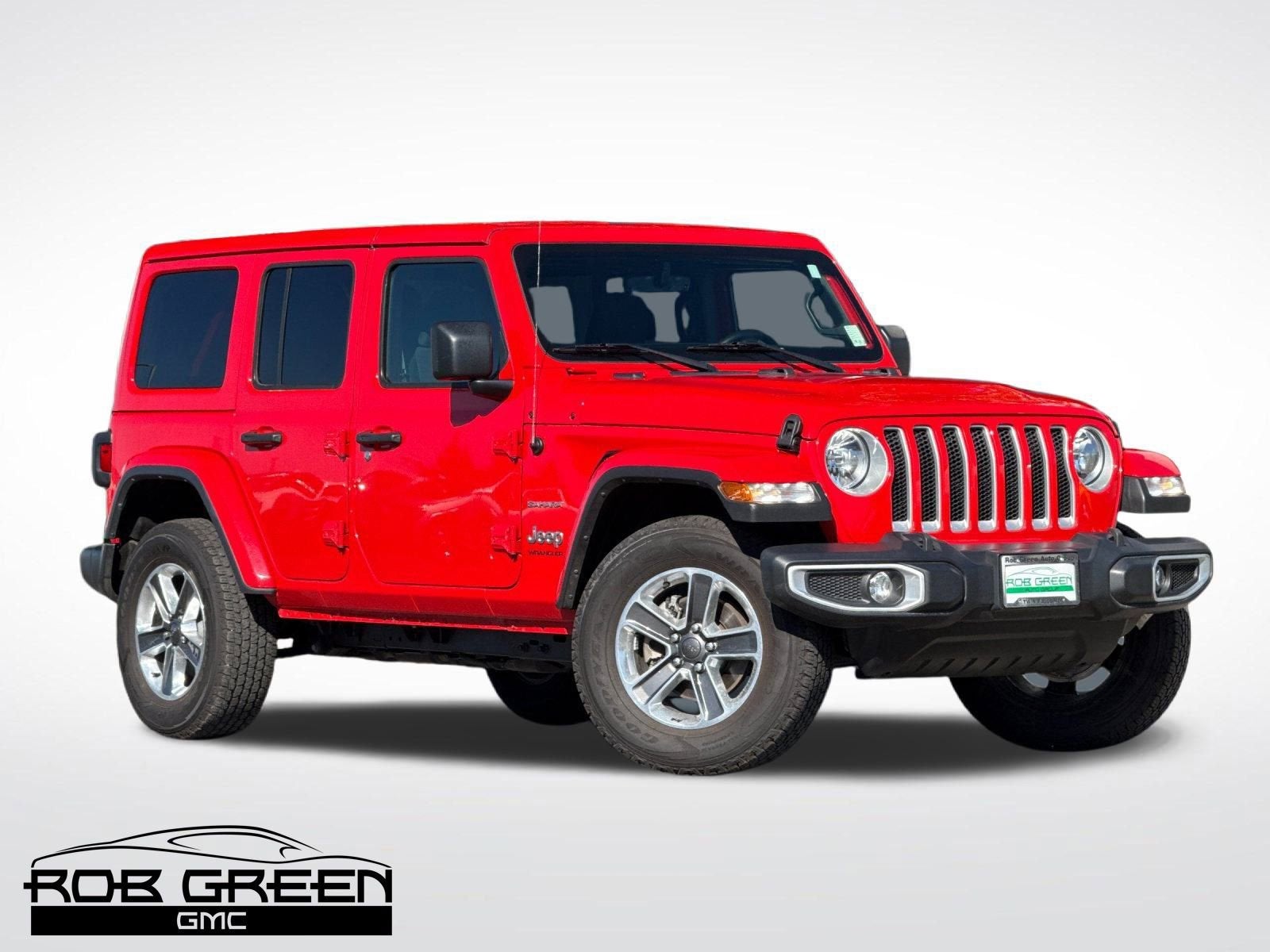 2023 Jeep Wrangler Sahara in Red — front three-quarter view