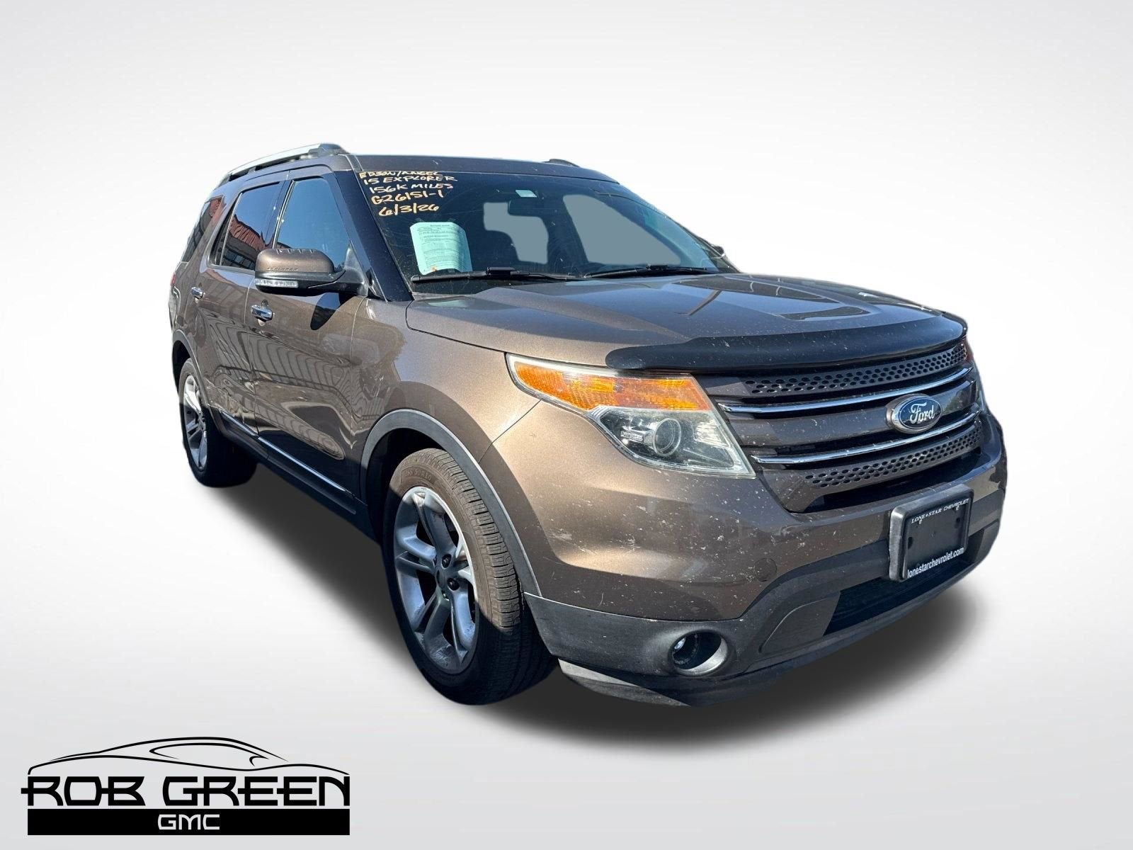 2015 Ford Explorer Limited in Beige — front three-quarter view