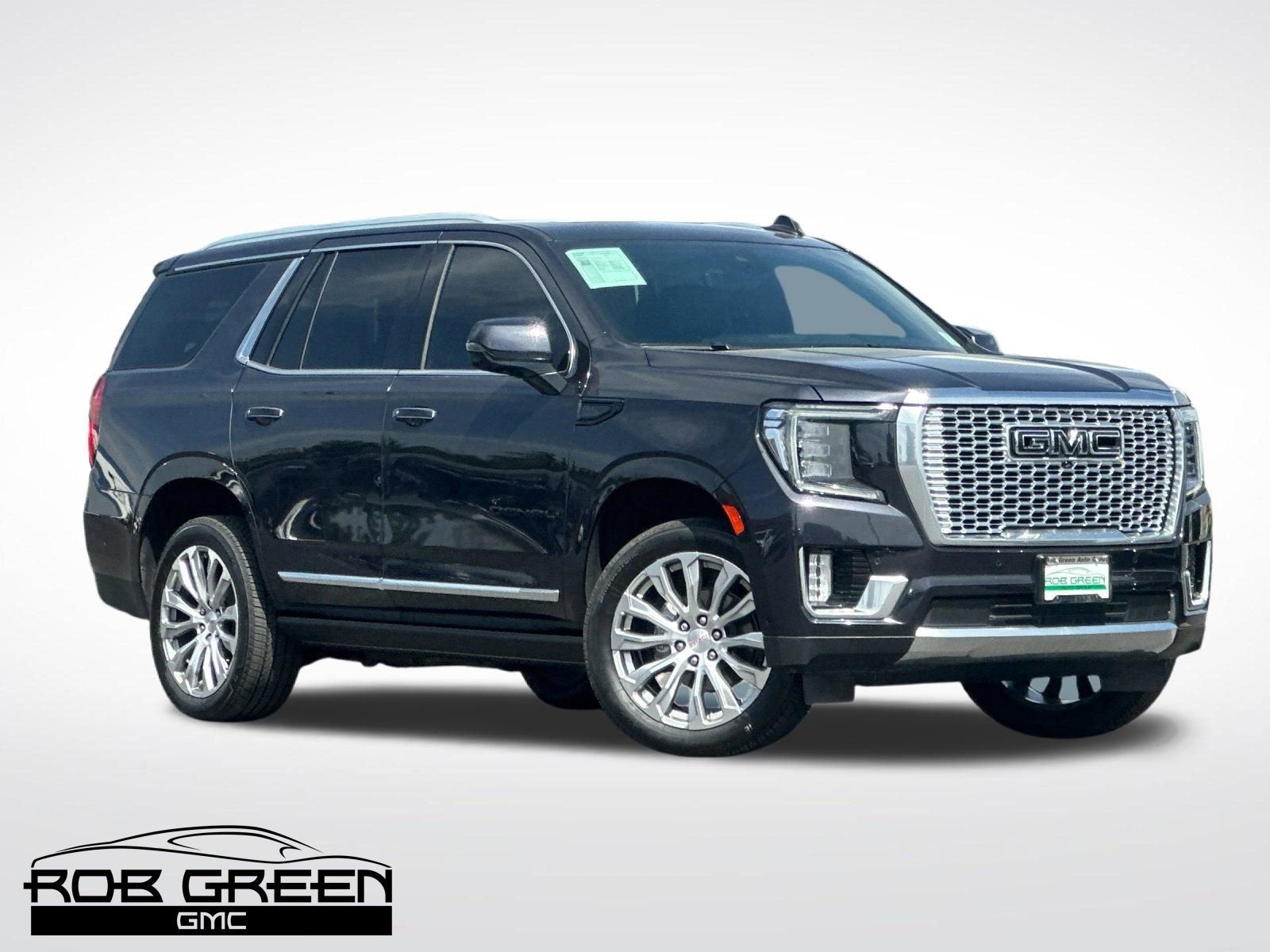 2023 GMC Yukon Denali in Titanium Rush Metallic — front three-quarter view