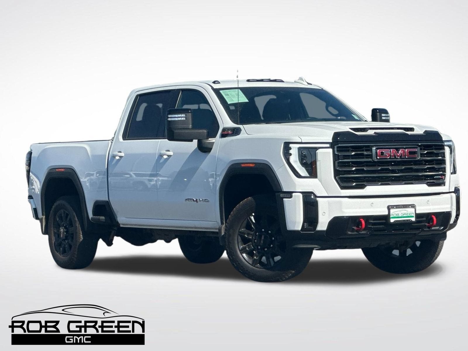 2025 GMC Sierra 2500 HD AT4 in Summit White — front three-quarter view