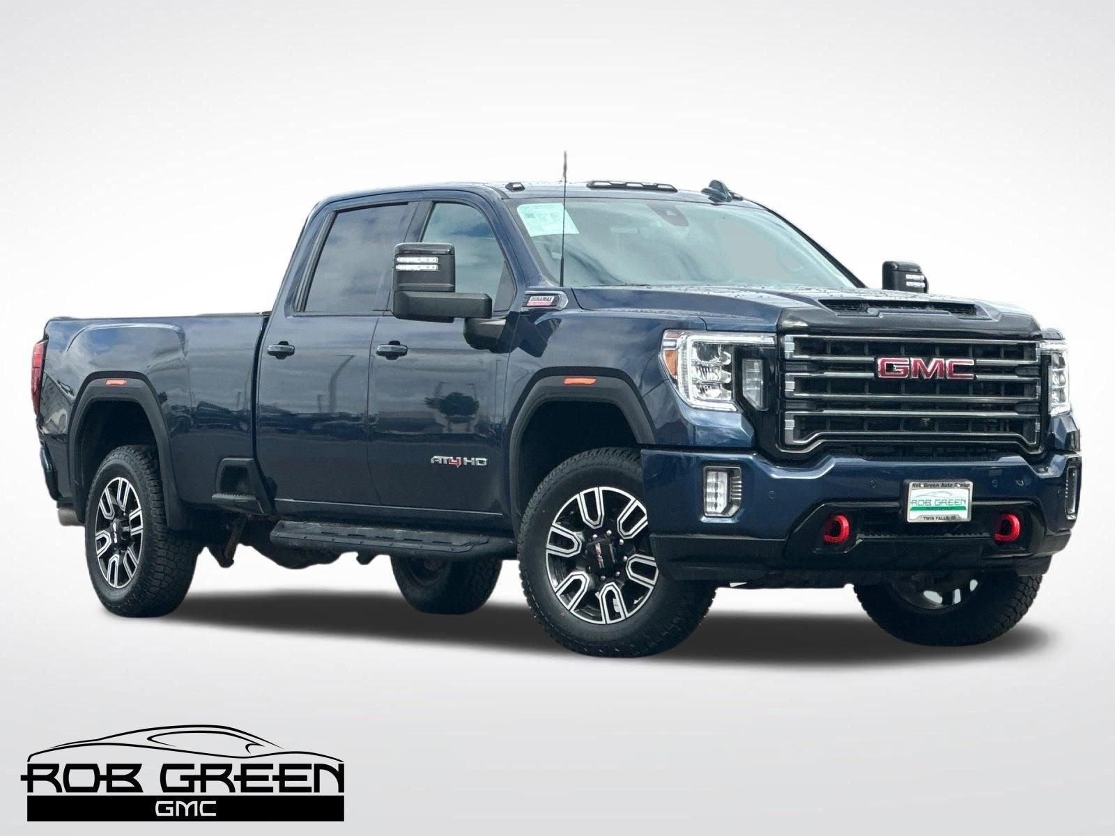 2023 GMC Sierra 3500 HD AT4 in Pacific Blue Metallic — front three-quarter view