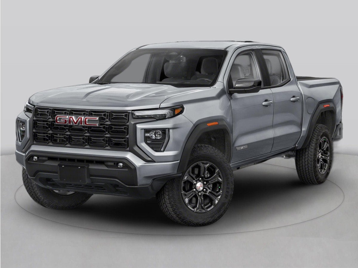 2026 GMC Canyon AT4 in Summit White — front three-quarter view