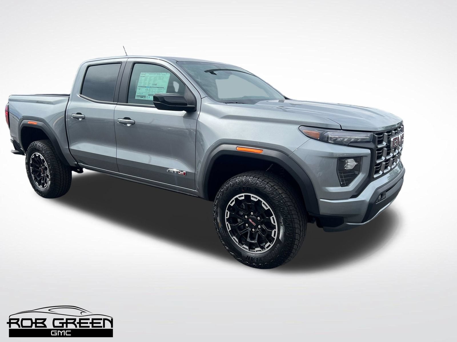 2026 GMC Canyon AT4 in Sterling Metallic — front three-quarter view