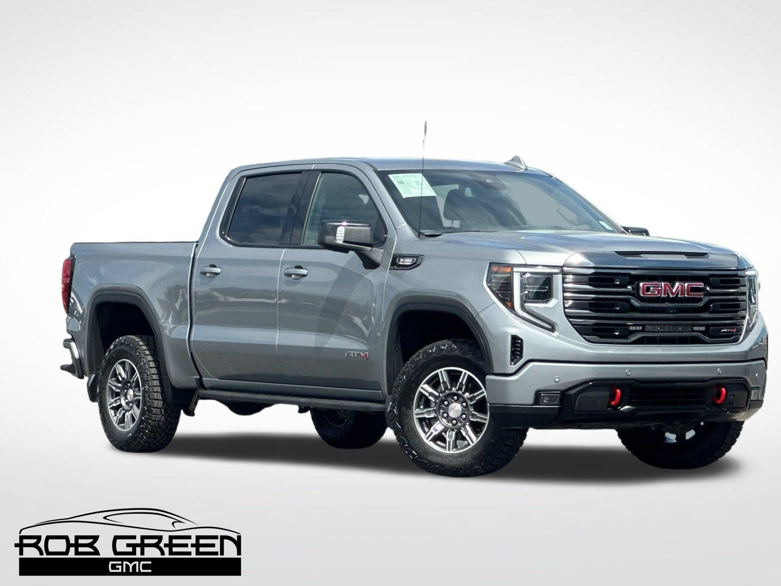 2024 GMC Sierra 1500 AT4 in Sterling Metallic — front three-quarter view