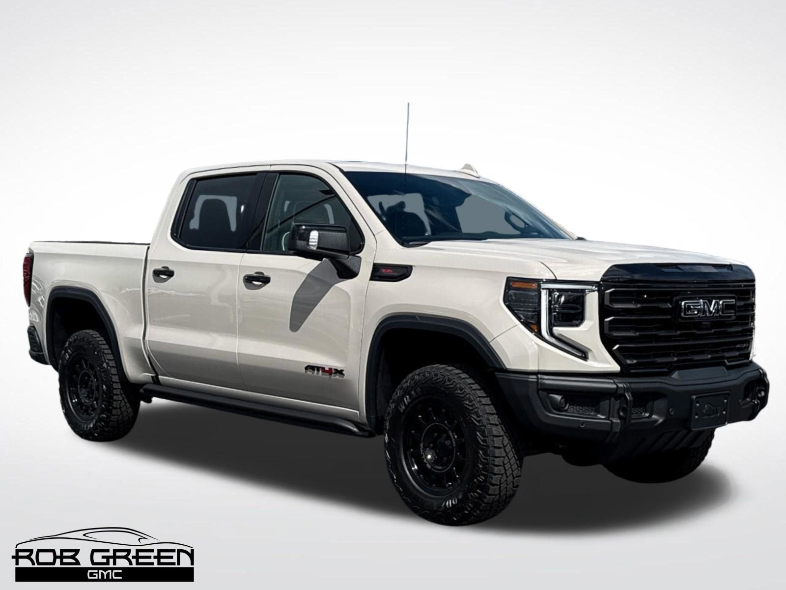 2026 GMC Sierra 1500 AT4X in Coastal Dune — front three-quarter view