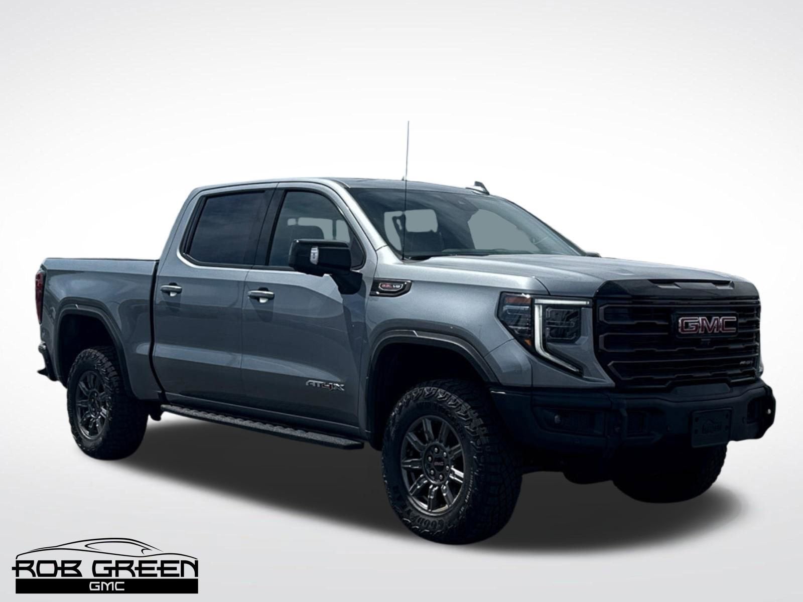 2026 GMC Sierra 1500 AT4X in Sterling Metallic — front three-quarter view