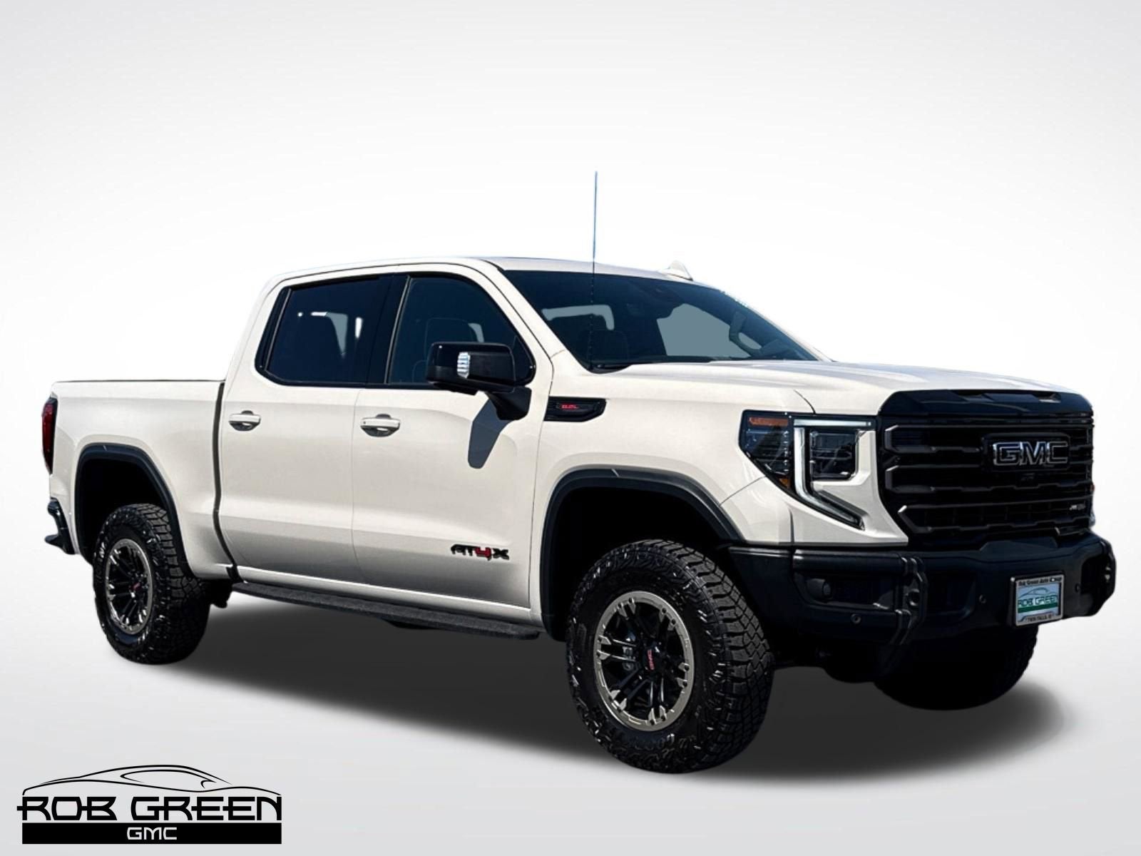 2026 GMC Sierra 1500 AT4X in Coastal Dune — front three-quarter view